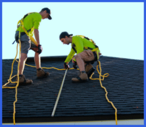 Professional team installing dark roof system