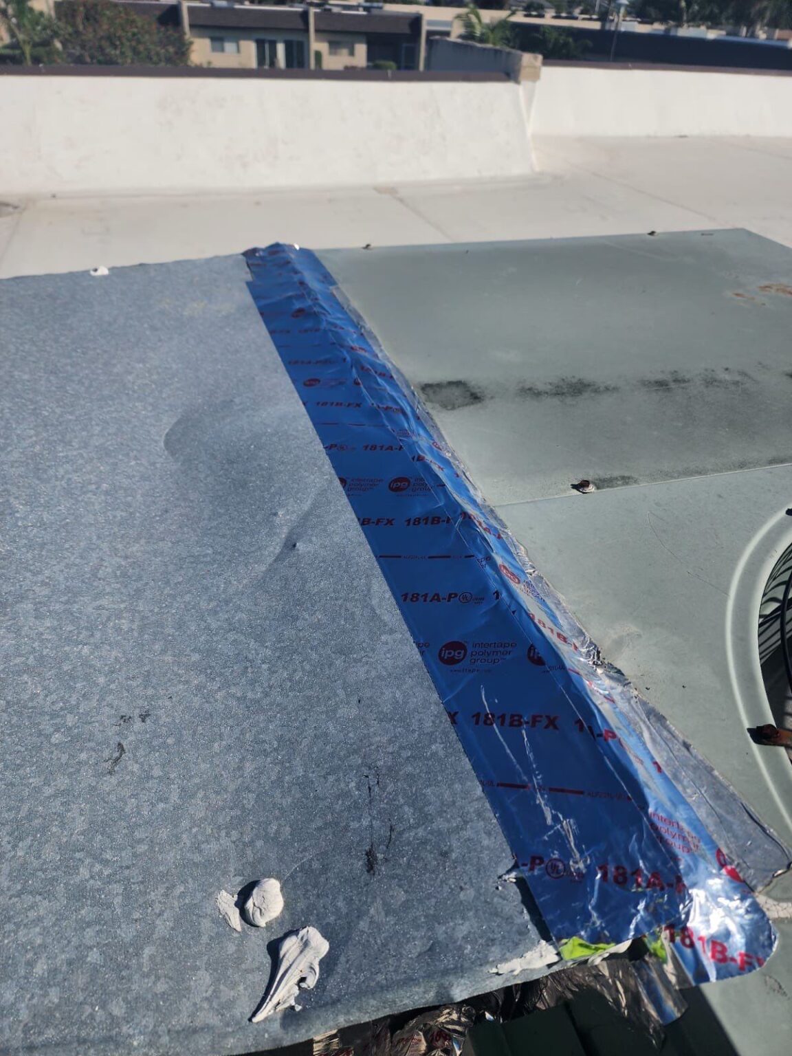 Roof surface material 12