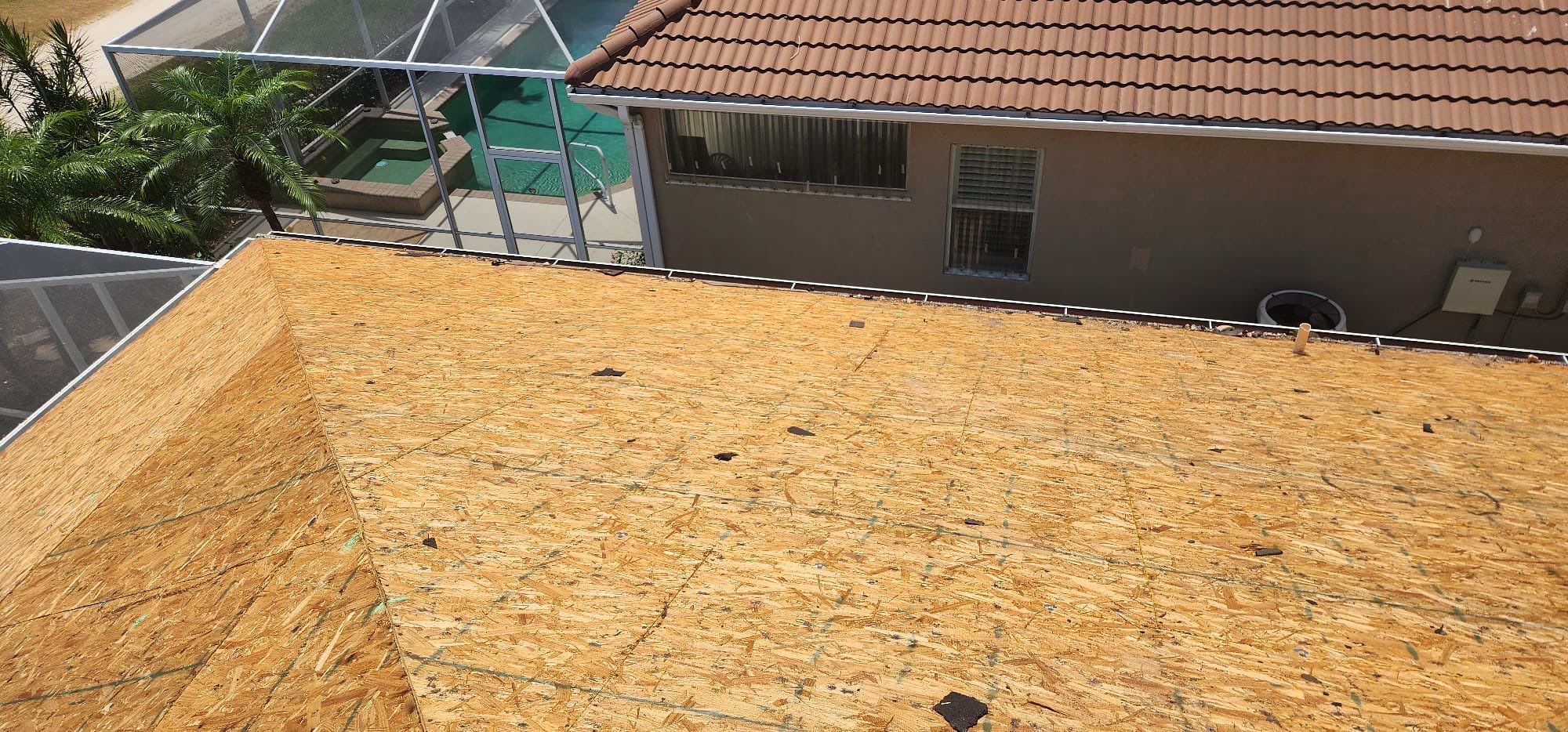 Membrane flat roof residential with tile edge