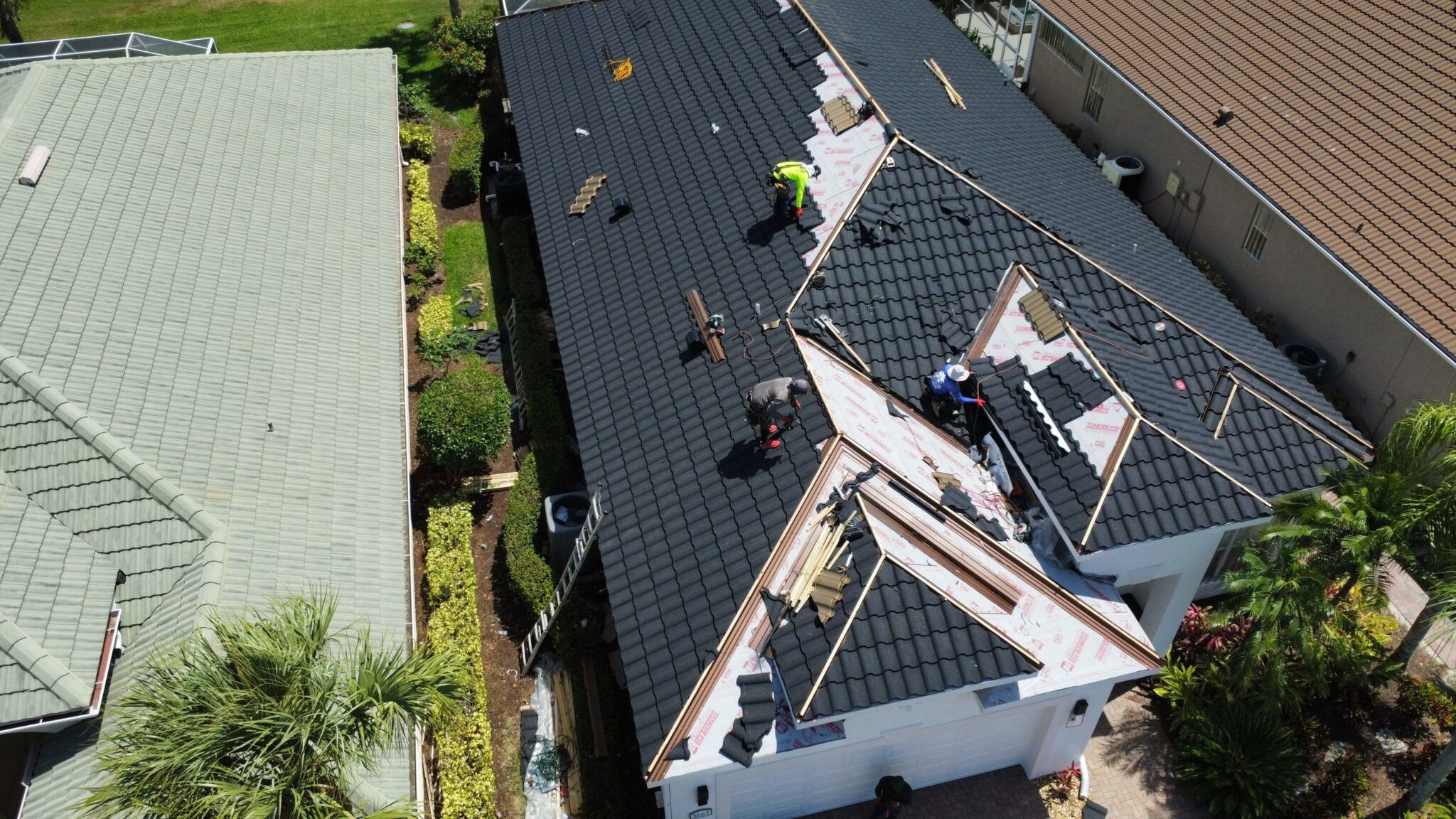 Plywood roof deck installation progress