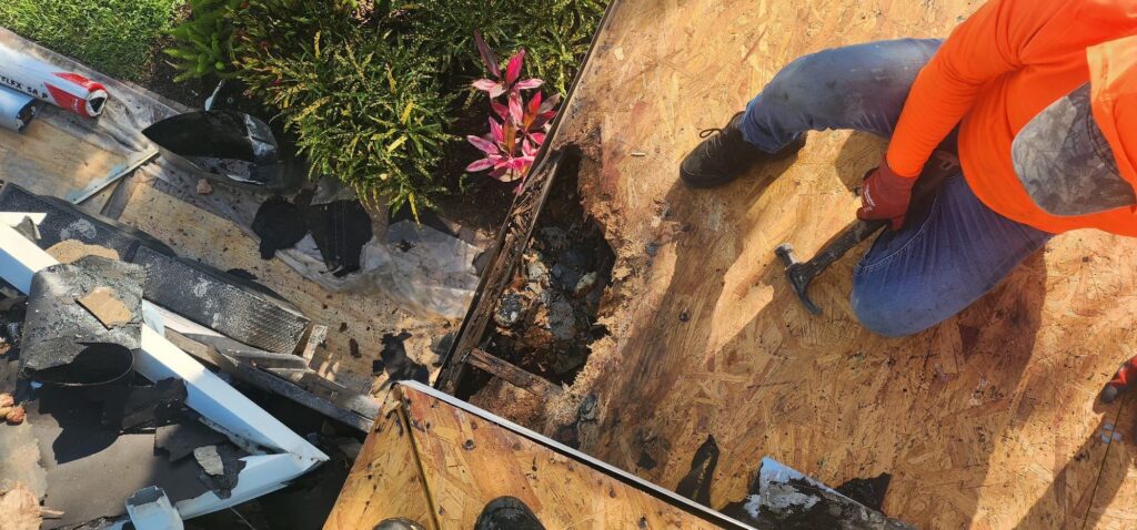 Plywood sheathing roof deck worker progress