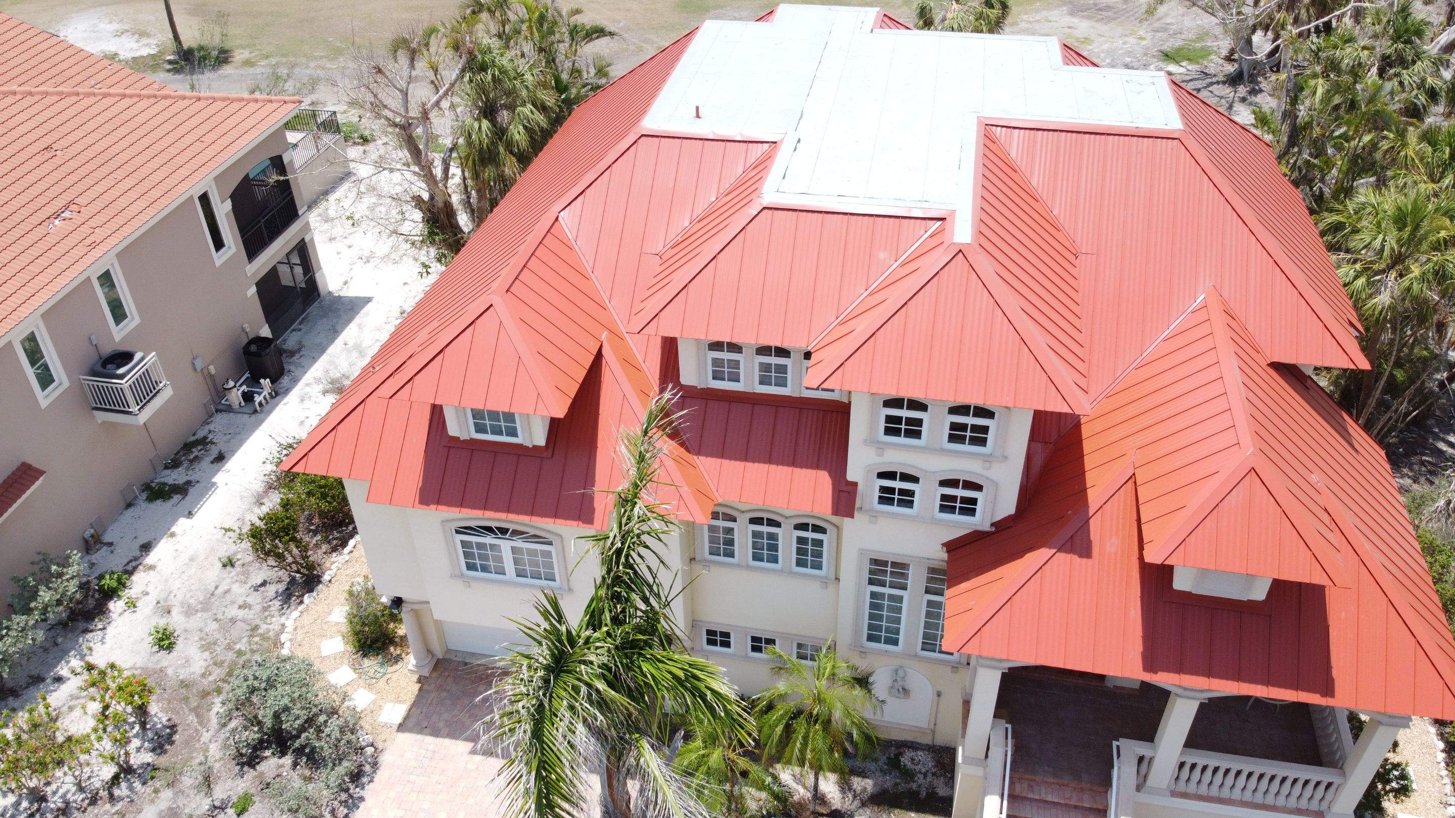 Gray shingle roof residential aerial completed