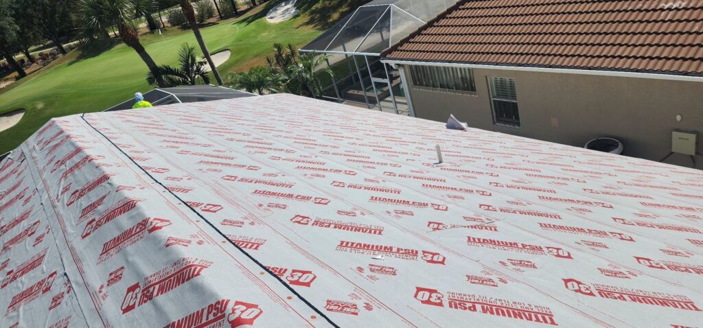 Gray shingle roof residential installation progress