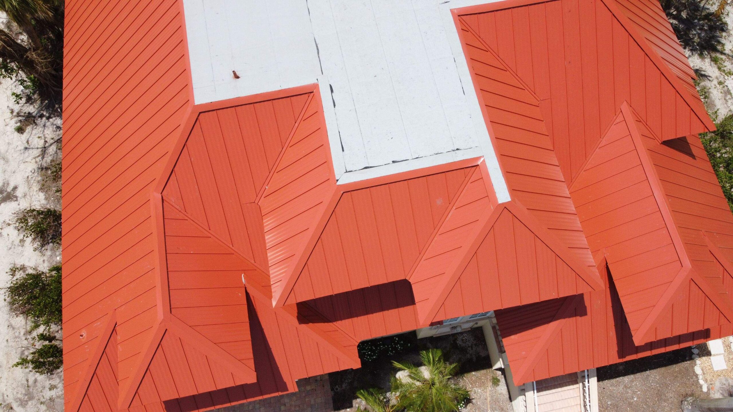 Brown tile roof residential aerial complex view